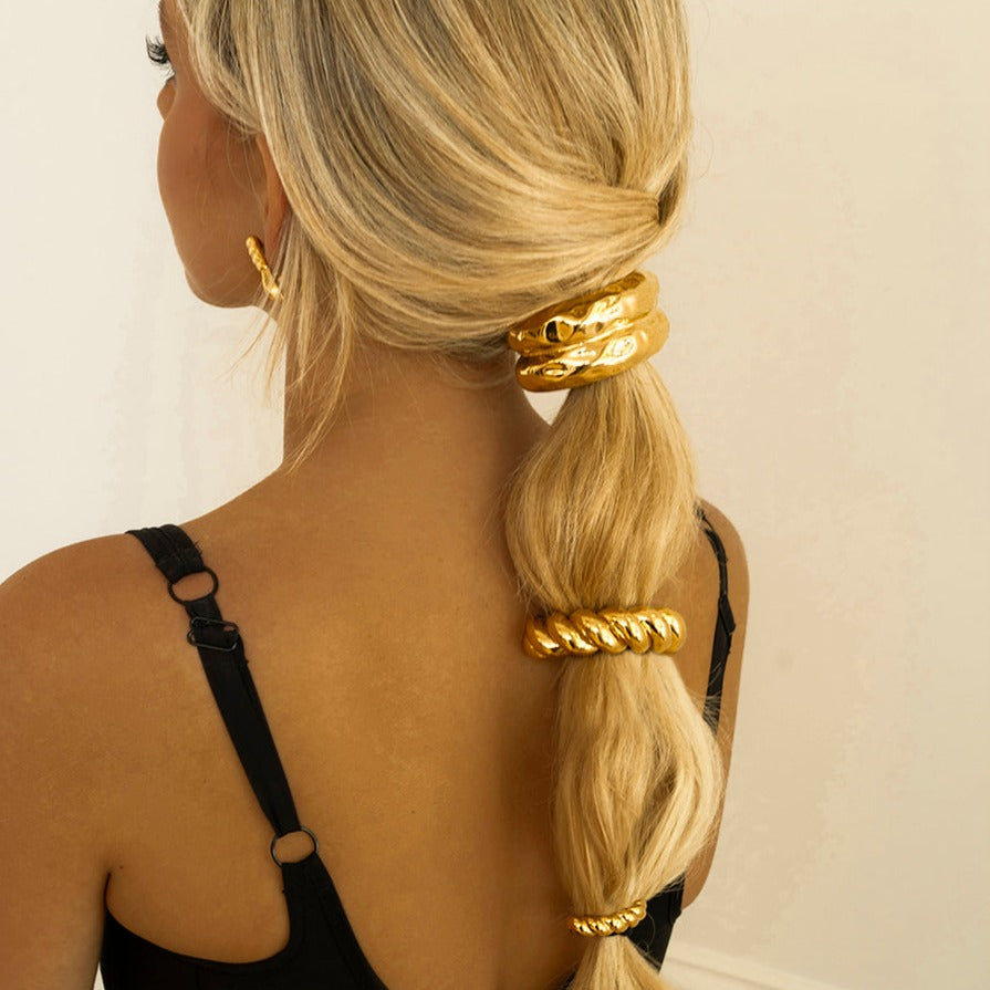 Twist Pony Manschette