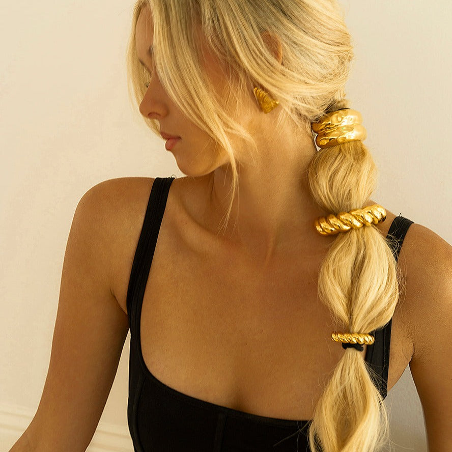 Twist Pony Manschette