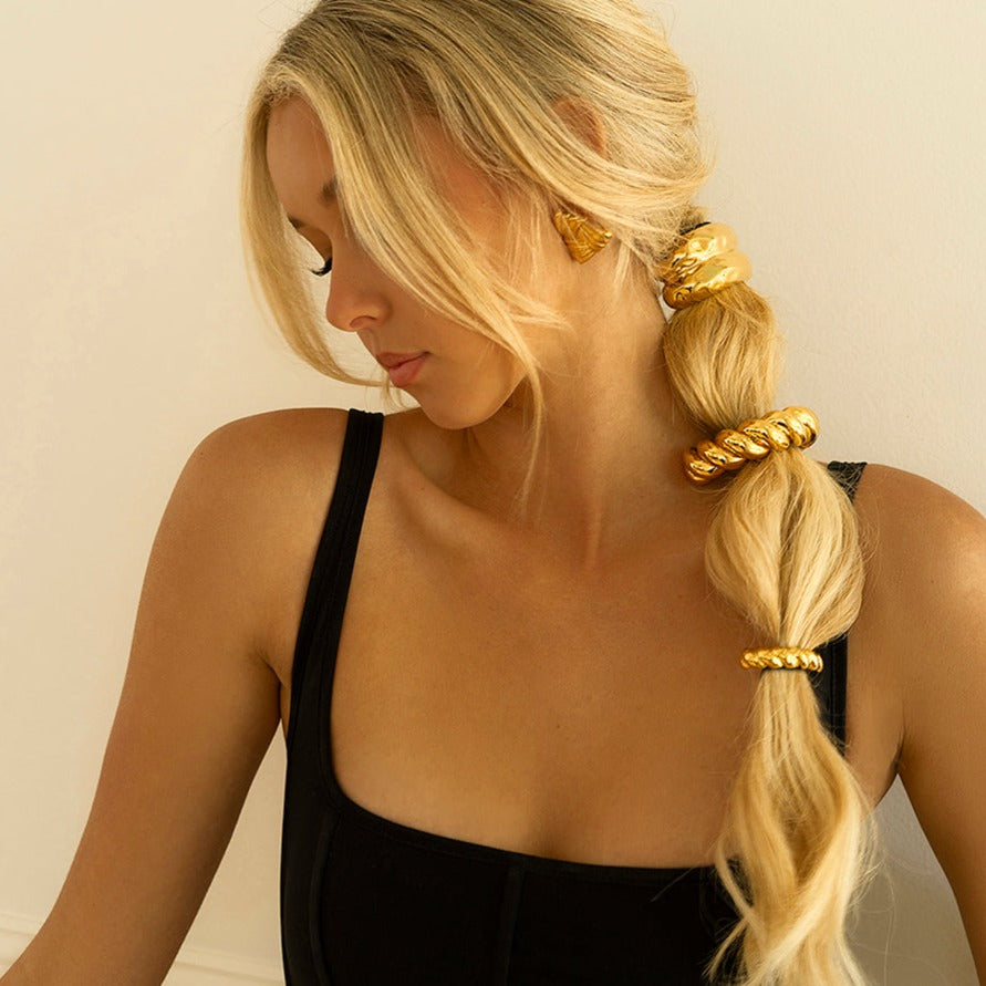 Twist Pony Manschette