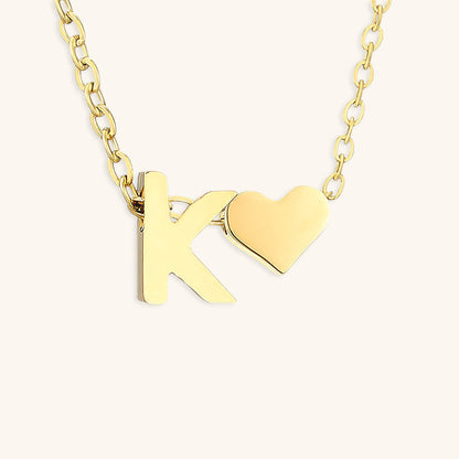 Goldkette mit dem Anfangsbuchstaben „Ria“