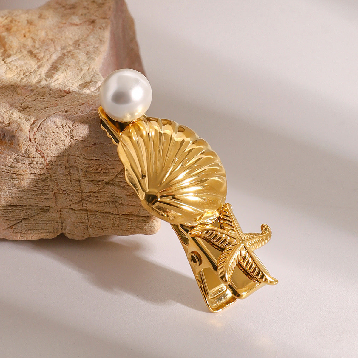Tidal Treasures – Goldene Haarspange