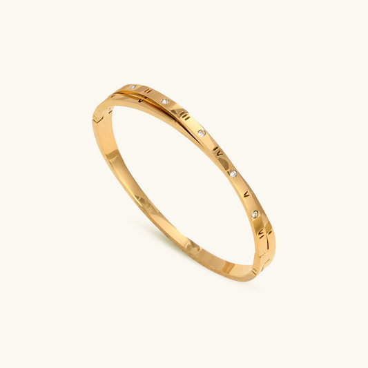 Armreif mit verschlungenen römischen Ziffern - Gold