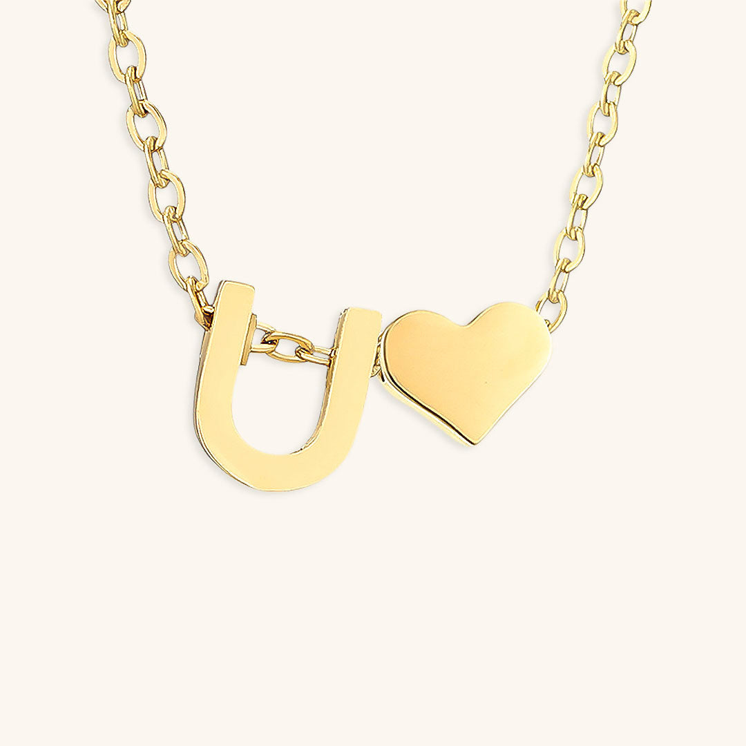 Goldkette mit dem Anfangsbuchstaben „Ria“